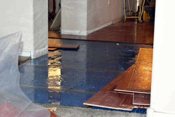 Professional Flood Damage Restoration technician working in Copiague, NY